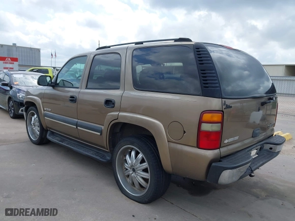 2003 Chevrolet Tahoe LS with VIN 1GNEC13V33J338251, listed as a IAAI auction lot 41634451 with 265,779 mi miles. Bid and sale history available at carsss.com. Image 3.