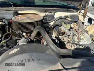 1993 GMC Yukon with VIN 1GKEK18K9PJ718702, listed as a Copart auction lot 82847154 with 103,848 mi miles and Clean Title. Bid and sale history available at carsss.com. Image 7.