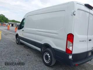 2022 Ford Transit Cargo with VIN 1FTBR1C85NKA74578, listed as a IAAI auction lot 42316744 with 63,376 mi miles and . Bid and sale history available at DreamBid. Image 3.