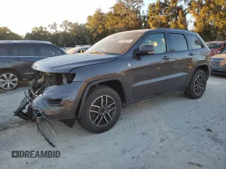 2020 Jeep Grand Cherokee Trailhawk with VIN 1C4RJFLT6LC417087, listed as a Copart auction lot 82244724 with 73,264 mi miles and Salvage title. Bid and sale history available at DreamBid. Image 1.