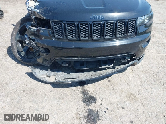 2019 Jeep Grand Cherokee Altitude with VIN 1C4RJFAG8KC808309, listed as a IAAI auction lot 41977457 with 122,923 mi miles and . Bid and sale history available at DreamBid. Image 17.