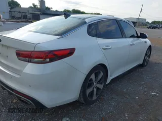 2016 Kia Optima SX Turbo z VIN 5XXGW4L20GG016368, wystawiony jako IAAI lot #42610152 z przebiegiem 165 525 mil mil oraz . Historia ofert i sprzedaży dostępna na DreamBid. Obrazek 4.