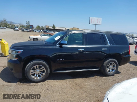 2015 Chevrolet Tahoe LT with VIN 1GNSCBKC8FR612607, listed as a IAAI auction lot 42099907 with 138,037 mi miles and . Bid and sale history available at DreamBid. Image 14.
