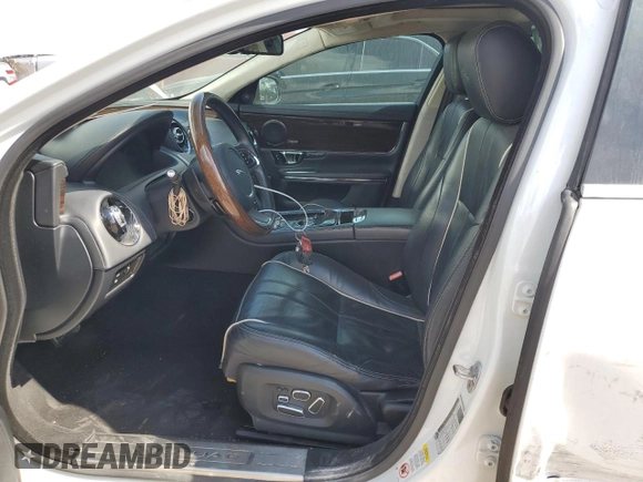 2014 Jaguar XJ with VIN SAJWA2GZ3E8V70365, listed as a Copart auction lot 42545995 with 65,649 mi miles and Salvage Title. Bid and sale history available at carsss.com. Image 7.