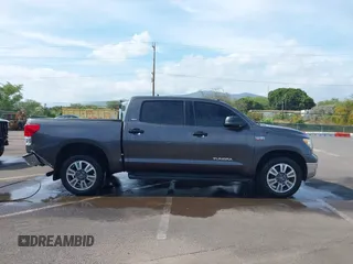 2011 Toyota Tundra z VIN 5TFEY5F14BX106229, wystawiony jako IAAI lot #42118006 z przebiegiem 96 465 mil mil oraz . Historia ofert i sprzedaży dostępna na DreamBid. Obrazek 13.