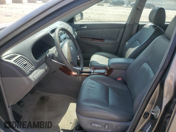2005 Toyota Camry LE with VIN 4T1BF32K85U614653, listed as a Copart auction lot 52860195 with 156,675 mi miles and Salvage Title. Bid and sale history available at DreamBid. Image 7.