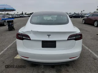 2020 Tesla Model 3 Standard Range Plus with VIN 5YJ3E1EA5LF747010, listed as a Copart auction lot 50937975 with Not Provided miles and Salvage Title. Bid and sale history available at DreamBid. Image 6.