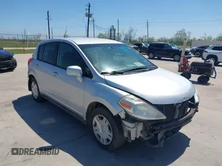 2010 Nissan Versa 1.8 S with VIN 3N1BC1CP7AL433675, listed as a IAAI auction lot 41879386 with 219,794 mi miles. Bid and sale history available at carsss.com. Image 1.
