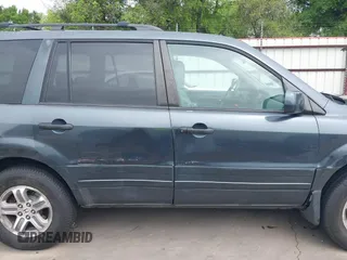 2005 Honda Pilot EX-L with VIN 5FNYF18565B046464, listed as a IAAI auction lot 41879495 with 228,021 mi miles. Bid and sale history available at carsss.com. Image 14.