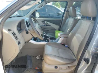 2005 Mercury Mariner Luxury z VIN 4M2CU57125DJ16694, wystawiony jako Copart lot #69063704 z przebiegiem 222 793 mil mil oraz Szkody całkowita. Historia ofert i sprzedaży dostępna na DreamBid. Obrazek 7.