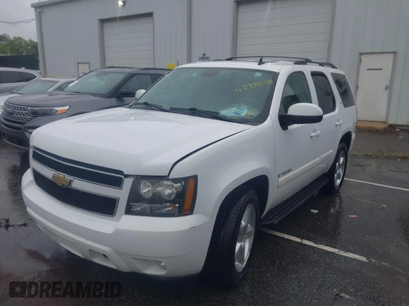 2009 Chevrolet Tahoe 2LT z VIN 1GNFC23059R217780, wystawiony jako IAAI lot #42334678 z przebiegiem 136 182 mil mil oraz . Historia ofert i sprzedaży dostępna na DreamBid. Obrazek 2.