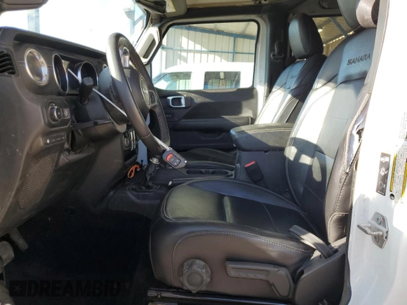 2023 Jeep Wrangler Sahara with VIN 1C4JJXP66PW642489, listed as a Copart auction lot 63671805 with Not provided miles and Clean title. Bid and sale history available at DreamBid. Image 7.