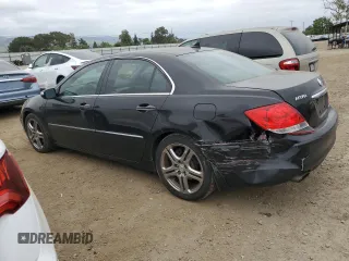 2006 Acura RL z VIN JH4KB16506C011226, wystawiony jako Copart lot #53918385 z przebiegiem 200 433 mil mil oraz Szkoda całkowita • Salvage title. Historia ofert i sprzedaży dostępna na DreamBid. Obrazek 2.