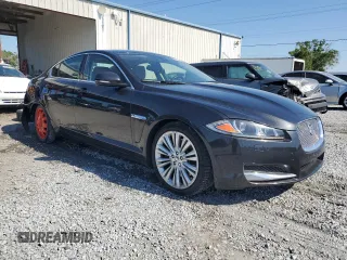 2012 Jaguar XF Portfolio with VIN SAJWA0HB4CLS35664, listed as a Copart auction lot 53427265 with 98,731 mi miles and Salvage Title. Bid and sale history available at carsss.com. Image 4.