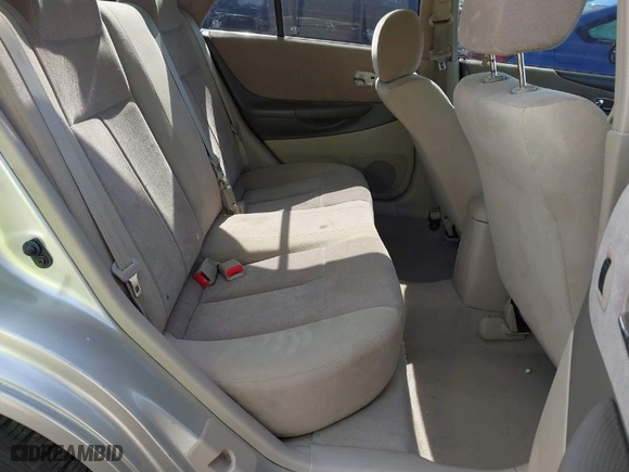 2003 Mazda Protege DX with VIN JM1BJ225731212628, listed as a IAAI auction lot 41374927 with 105,662 mi miles. Bid and sale history available at carsss.com. Image 8.