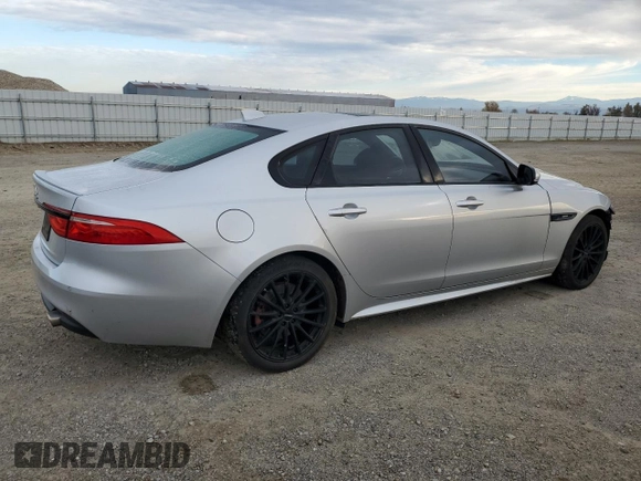 2016 Jaguar XF with VIN SAJBL4BV6GCY16964, listed as a Copart auction lot 82786584 with 100,587 mi miles and Salvage Title. Bid and sale history available at DreamBid. Image 3.