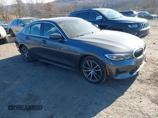 2022 BMW 3 Series 330i xDrive with VIN 3MW5R7J01N8C32331, listed as a IAAI auction lot 40766569 with 27,105 mi miles. Bid and sale history available at carsss.com. Image 1.