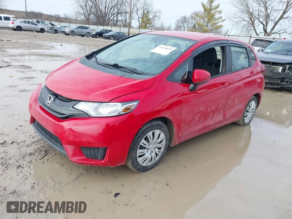 2015 Honda Fit LX z VIN 3HGGK5H54FM728448, wystawiony jako IAAI lot #41538650 z przebiegiem 115 450 mil mil oraz . Historia ofert i sprzedaży dostępna na DreamBid. Obrazek 17.