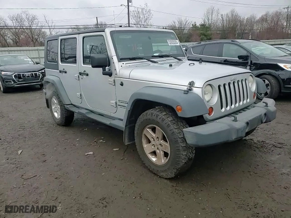2010 Jeep Wrangler Unlimited Sport with VIN 1J4BA3H1XAL204156, listed as a Copart auction lot 52935355 with 215,228 mi miles and Salvage Title. Bid and sale history available at carsss.com. Image 11.