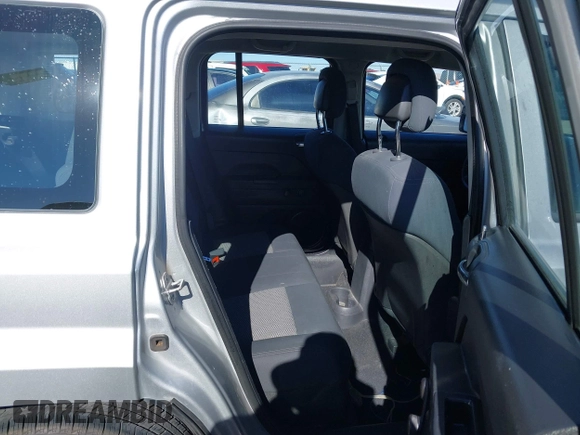 2010 Jeep Patriot Sport with VIN 1J4NT2GB1AD519675, listed as a IAAI auction lot 41321426 with 239,093 mi miles. Bid and sale history available at carsss.com. Image 8.