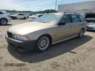 2001 BMW 5 Series 525i with VIN WBADS43471GD84742, listed as a Copart auction lot 57748105 with 141,774 mi miles and Salvage title. Bid and sale history available at DreamBid. Image 1.