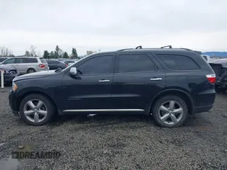 2013 Dodge Durango Citadel with VIN 1C4SDHET9DC510172, listed as a IAAI auction lot 41829385 with 133,710 mi miles and . Bid and sale history available at carsss.com. Image 14.