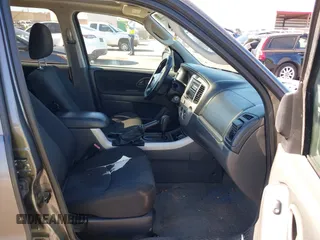 2006 Mazda Tribute S with VIN 4F2CZ04196KM12520, listed as a IAAI auction lot 41872221 with Not Provided miles and . Bid and sale history available at carsss.com. Image 5.