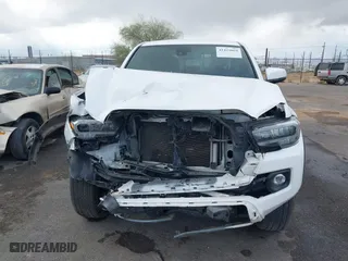 2020 Toyota Tacoma 2WD SR5 with VIN 3TMAZ5CN2LM133990, listed as a IAAI auction lot 41423069 with 56,184 mi miles. Bid and sale history available at carsss.com. Image 13.