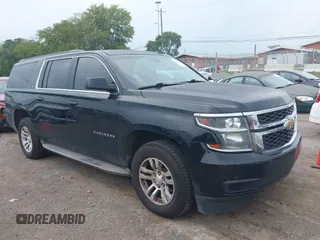 2015 Chevrolet Suburban LT z VIN 1GNSKJKC8FR275532, wystawiony jako IAAI lot #39910687 z przebiegiem 173 720 mil mil oraz . Historia ofert i sprzedaży dostępna na DreamBid. Obrazek 1.