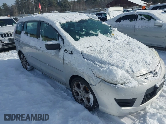2008 Mazda 5 Grand Touring z VIN JM1CR29L080317641, wystawiony jako IAAI lot #41479115 z przebiegiem 210 431 mil mil oraz . Historia ofert i sprzedaży dostępna na DreamBid. Obrazek 1.
