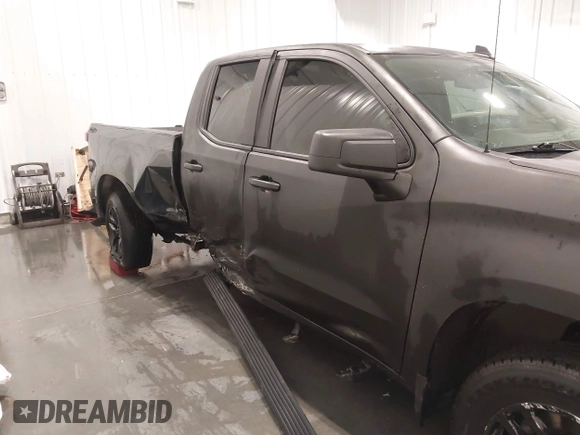 2021 Chevrolet Silverado 1500 RST with VIN 1GCRYEEDXMZ135111, listed as a IAAI auction lot 41398152 with 54,051 mi miles and . Bid and sale history available at DreamBid. Image 6.