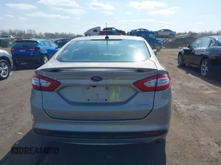 2016 Ford Fusion Titanium Hybrid with VIN 3FA6P0RU5GR171287, listed as a IAAI auction lot 41918195 with 74,721 mi miles. Bid and sale history available at carsss.com. Image 16.