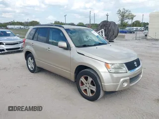 2008 Suzuki Grand Vitara Luxury z VIN JS3TD947384100130, wystawiony jako IAAI lot #41713955 z przebiegiem 180 631 mil mil oraz . Historia ofert i sprzedaży dostępna na DreamBid. Obrazek 1.