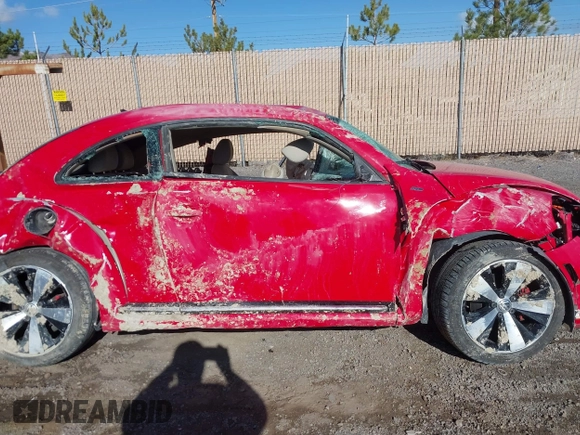 2014 Volkswagen Beetle Turbo R-Line with VIN 3VWVT7AT0EM603434, listed as a IAAI auction lot 41944413 with 64,470 mi miles and . Bid and sale history available at DreamBid. Image 13.