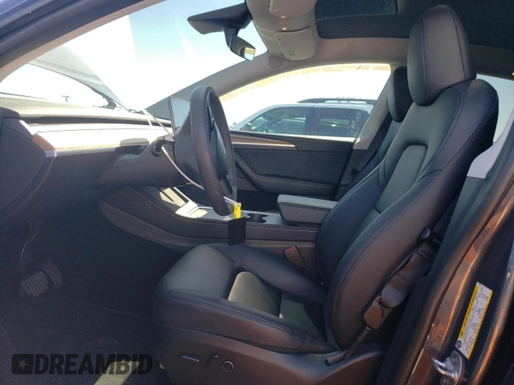 2023 Tesla Model Y Long Range with VIN 7SAYGDEE2PA047794, listed as a Copart auction lot 48397305 with 18,850 mi miles and Salvage Title. Bid and sale history available at DreamBid. Image 7.