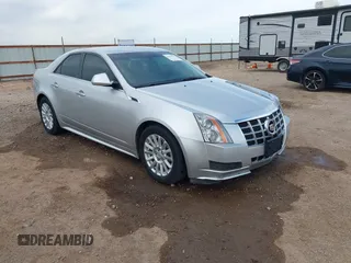 2013 Cadillac CTS Luxury with VIN 1G6DH5E58D0102036, listed as a IAAI auction lot 42270393 with 133,203 mi miles and . Bid and sale history available at DreamBid. Image 1.