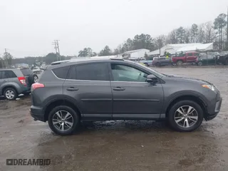 2018 Toyota RAV4 XLE with VIN 2T3RFREV5JW798328, listed as a IAAI auction lot 41868104 with 61,076 mi miles. Bid and sale history available at carsss.com. Image 13.