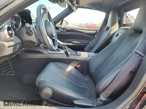 2022 Mazda MX-5 Miata Grand Touring z VIN JM1NDAM77N0503295, wystawiony jako Copart lot #58703795 z przebiegiem 14 237 mil mil oraz Szkoda całkowita • Salvage title. Historia ofert i sprzedaży dostępna na DreamBid. Obrazek 7.
