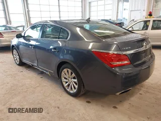 2014 Buick LaCrosse Leather with VIN 1G4GB5G39EF132695, listed as a IAAI auction lot 41728596 with 124,639 mi miles and . Bid and sale history available at DreamBid. Image 3.