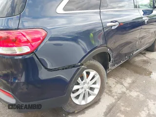 2017 Kia Sorento LX z VIN 5XYPG4A3XHG287217, wystawiony jako IAAI lot #42067077 z przebiegiem 112 324 mil mil oraz . Historia ofert i sprzedaży dostępna na DreamBid. Obrazek 18.