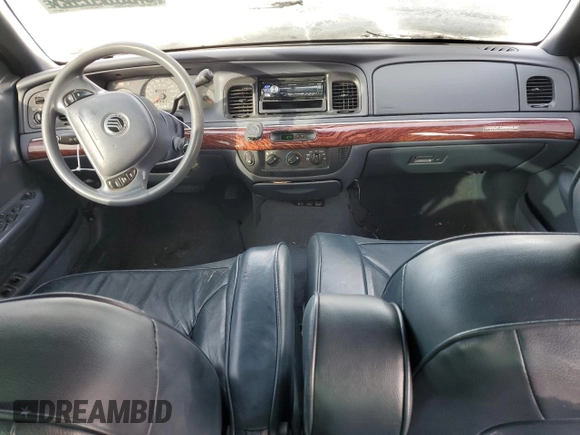 2001 Mercury Grand Marquis GS z VIN 2MEFM74W61X695639, wystawiony jako Copart lot #42099295 z przebiegiem 137 501 mil mil oraz Nie do naprawy • Non repairable. Historia ofert i sprzedaży dostępna na DreamBid. Obrazek 8.