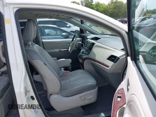 2011 Toyota Sienna XLE AAS with VIN 5TDYK3DC0BS008439, listed as a IAAI auction lot 42292552 with 115,162 mi miles and . Bid and sale history available at DreamBid. Image 5.