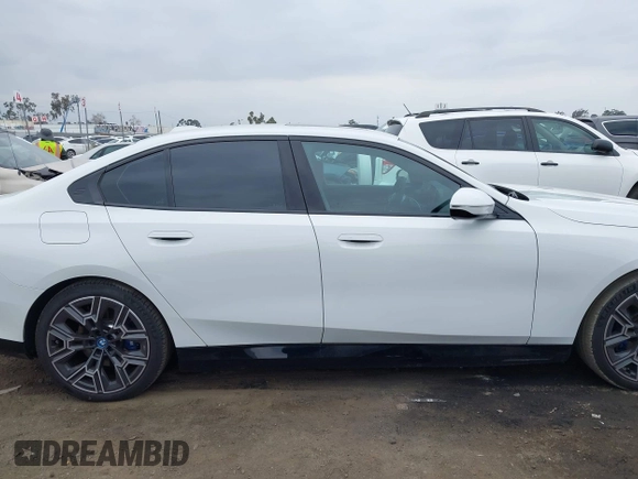 2024 BMW i5 eDrive40 with VIN WBY33FK02RCR97601, listed as a IAAI auction lot 41467405 with 12,799 mi miles. Bid and sale history available at carsss.com. Image 14.