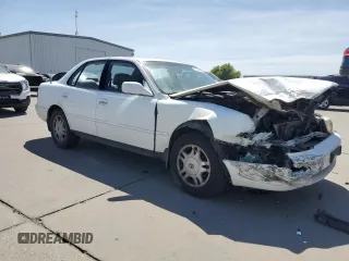 1996 Toyota Camry LE z VIN JT2BF12K2T0132606, wystawiony jako Copart lot #55530625 z przebiegiem 275 455 mil mil oraz Szkoda całkowita • Salvage title. Historia ofert i sprzedaży dostępna na DreamBid. Obrazek 4.