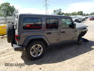 2022 Jeep Wrangler Unlimited Sahara Altitude with VIN 1C4HJXEG4NW248402, listed as a Copart auction lot 63052465 with 36,732 mi miles and Salvage title. Bid and sale history available at DreamBid. Image 3.
