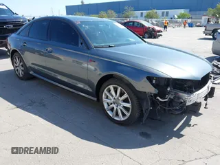 2014 Audi A6 3.0T Prestige with VIN WAUHGAFC9EN028196, listed as a IAAI auction lot 41993806 with 100,215 mi miles. Bid and sale history available at carsss.com. Image 1.
