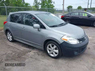2012 Nissan Versa S with VIN 3N1BC1CP9CK239898, listed as a IAAI auction lot 42210704 with 97,714 mi miles and . Bid and sale history available at DreamBid. Image 1.