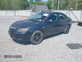 2009 Mazda 3 i Touring Value with VIN JM1BK32F291249221, listed as a IAAI auction lot 42006435 with 249,775 mi miles. Bid and sale history available at carsss.com. Image 2.