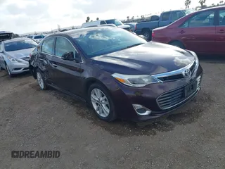2013 Toyota Avalon XLE with VIN 4T1BK1EB9DU005176, listed as a IAAI auction lot 41545929 with 173,405 mi miles and . Bid and sale history available at DreamBid. Image 1.