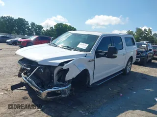 2019 Ford F-150 XL with VIN 1FTEW1C47KKE22590, listed as a IAAI auction lot 42418181 with 123,197 mi miles and . Bid and sale history available at DreamBid. Image 2.